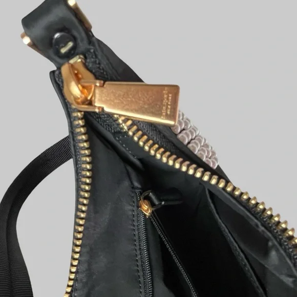 Kate Spade Embellished durable woven nylon with leather trim
Matte lining - Picture 11 of 12